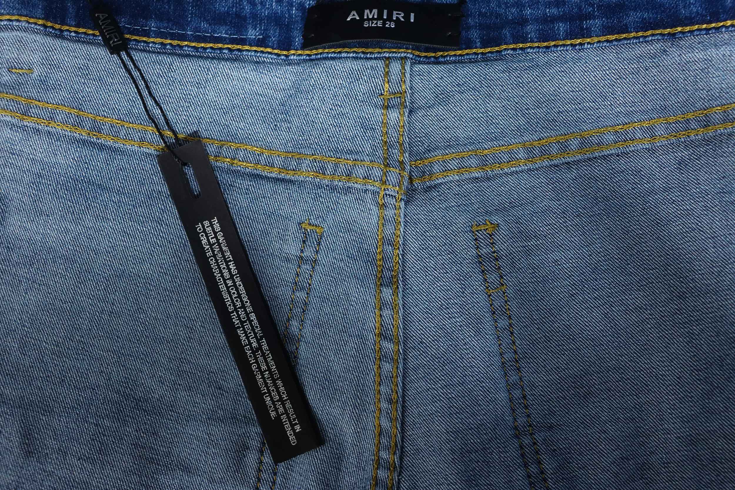 AMIRI MX1 Pink Diamond Washed Ripped Denim Pants