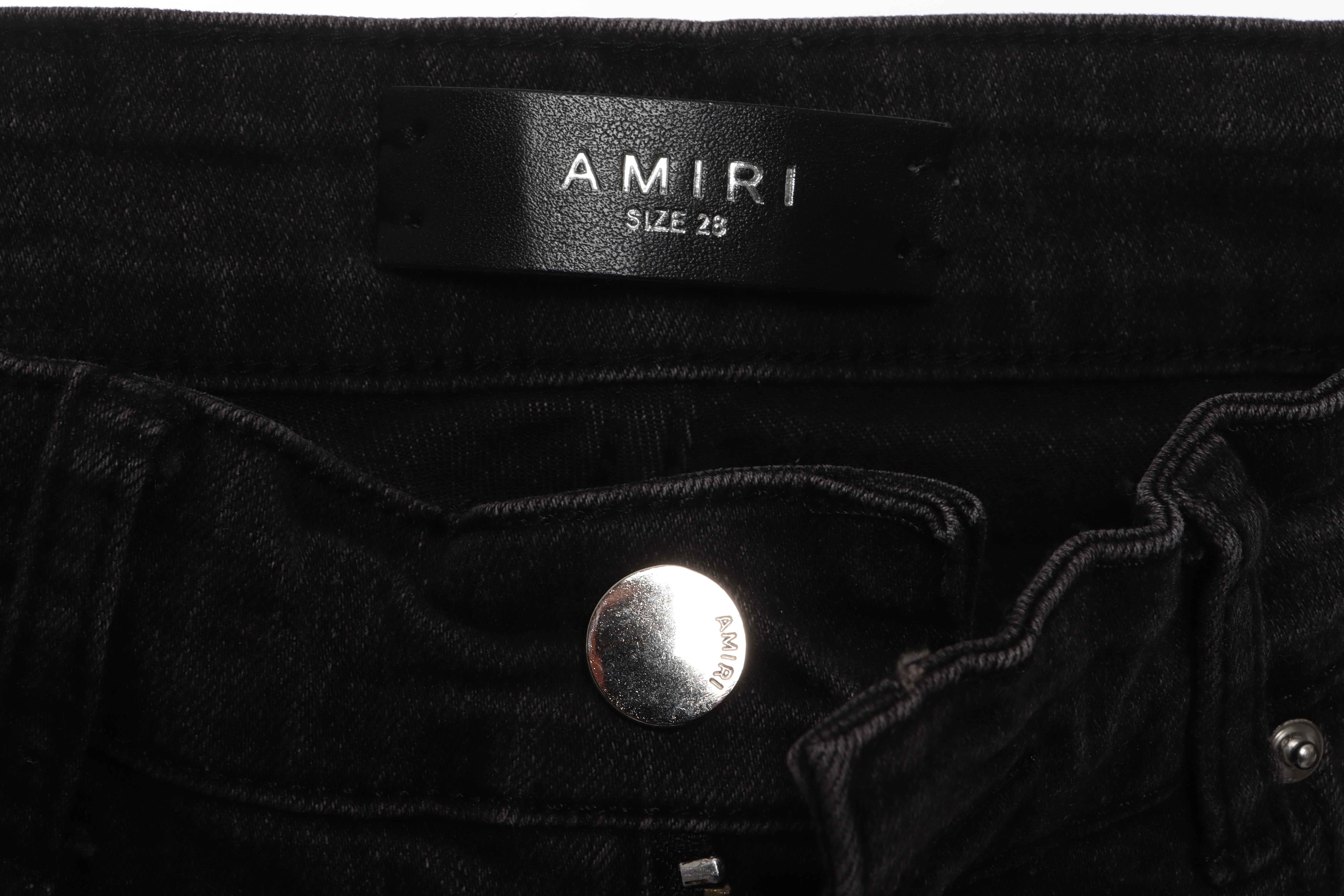 AMIRI Pink Ripped Jeans