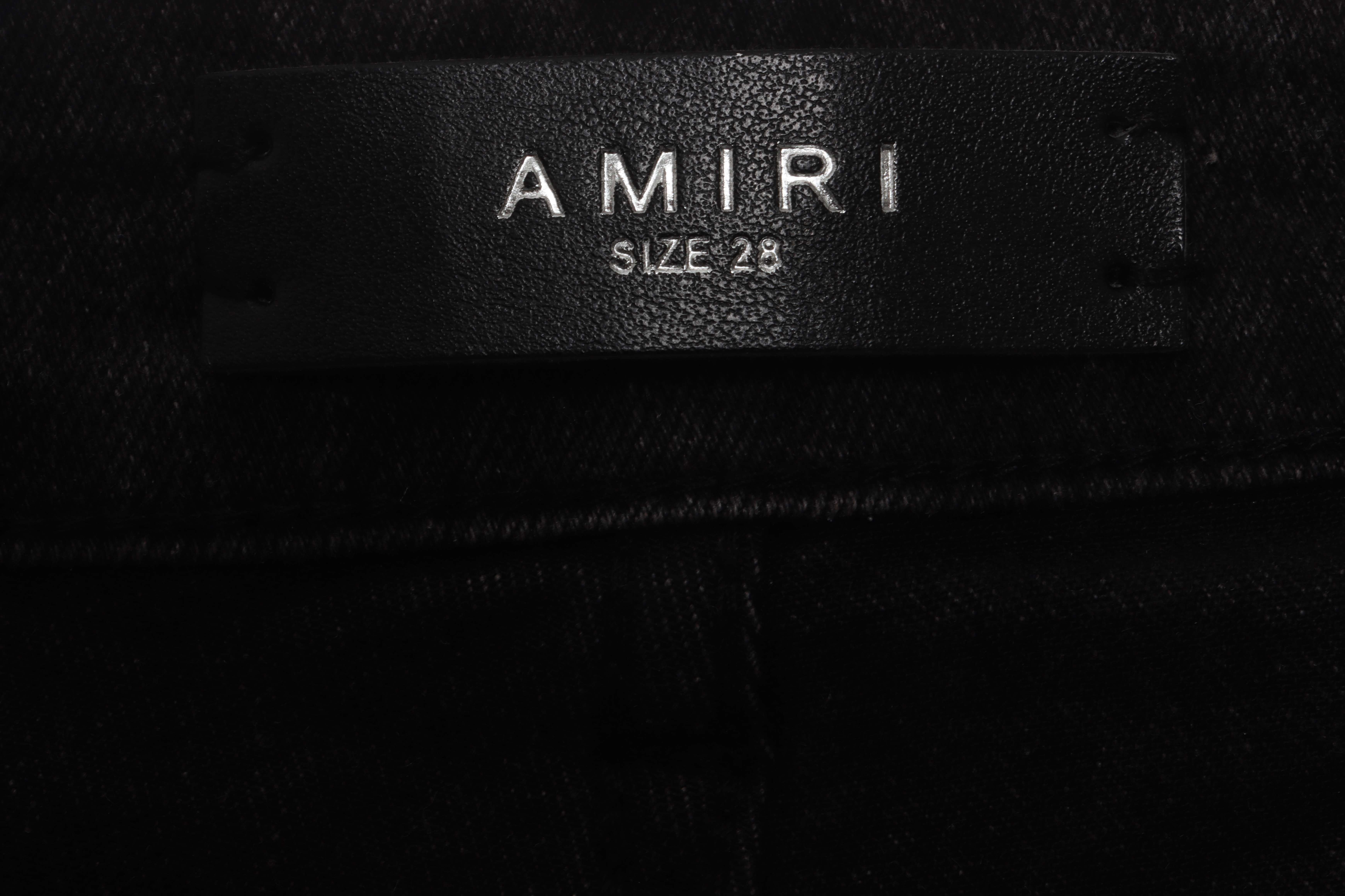 AMIRI Pink Ripped Jeans