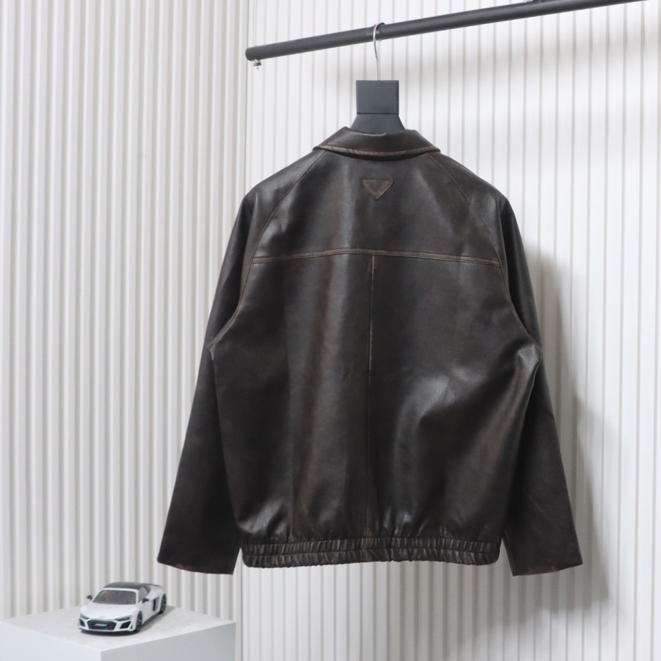 Prada Distressed Leather Jacket With Triangle Logo On Back