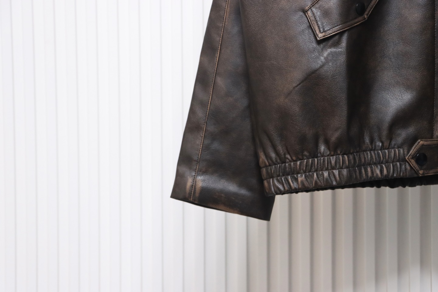 Prada Distressed Leather Jacket With Triangle Logo On Back