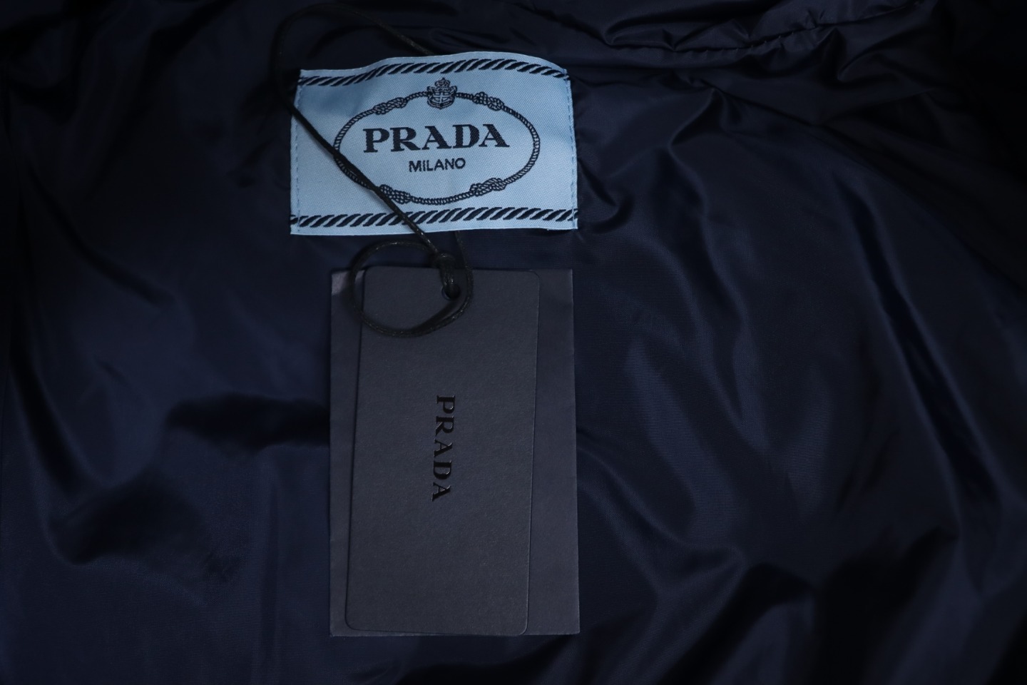 Prada Triangle Logo Solid Color Hooded Down Jacket