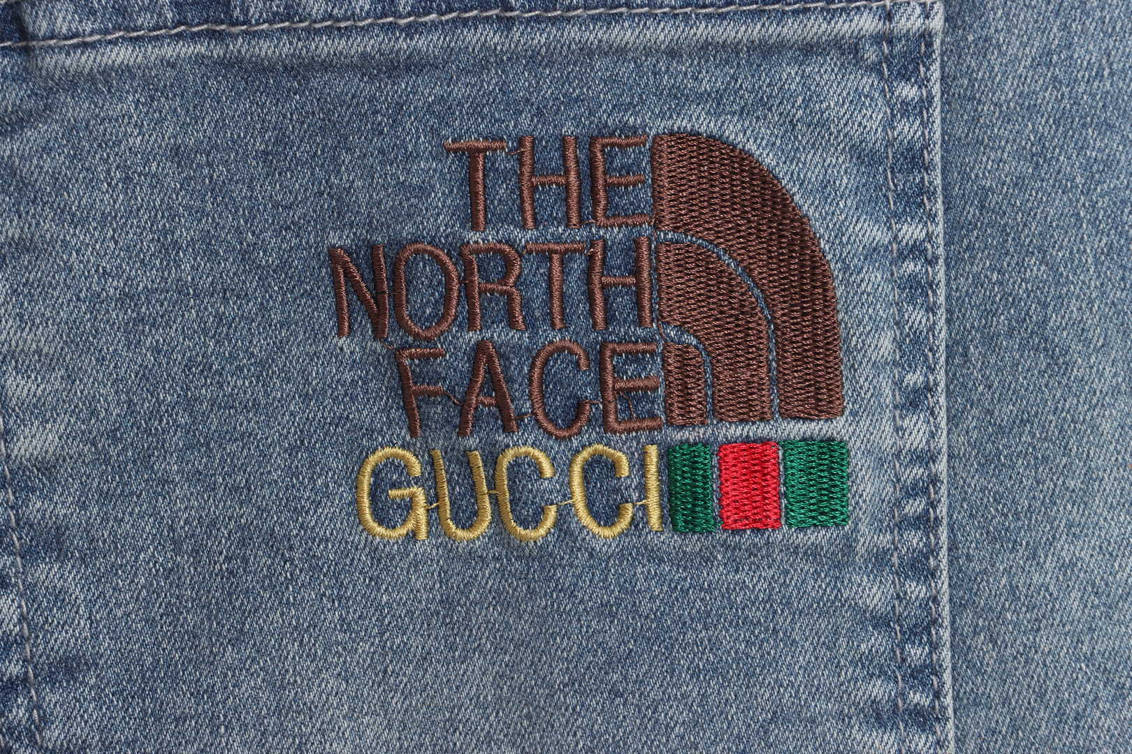 Gucci x The North Face Embroidered Logo Denim Trousers