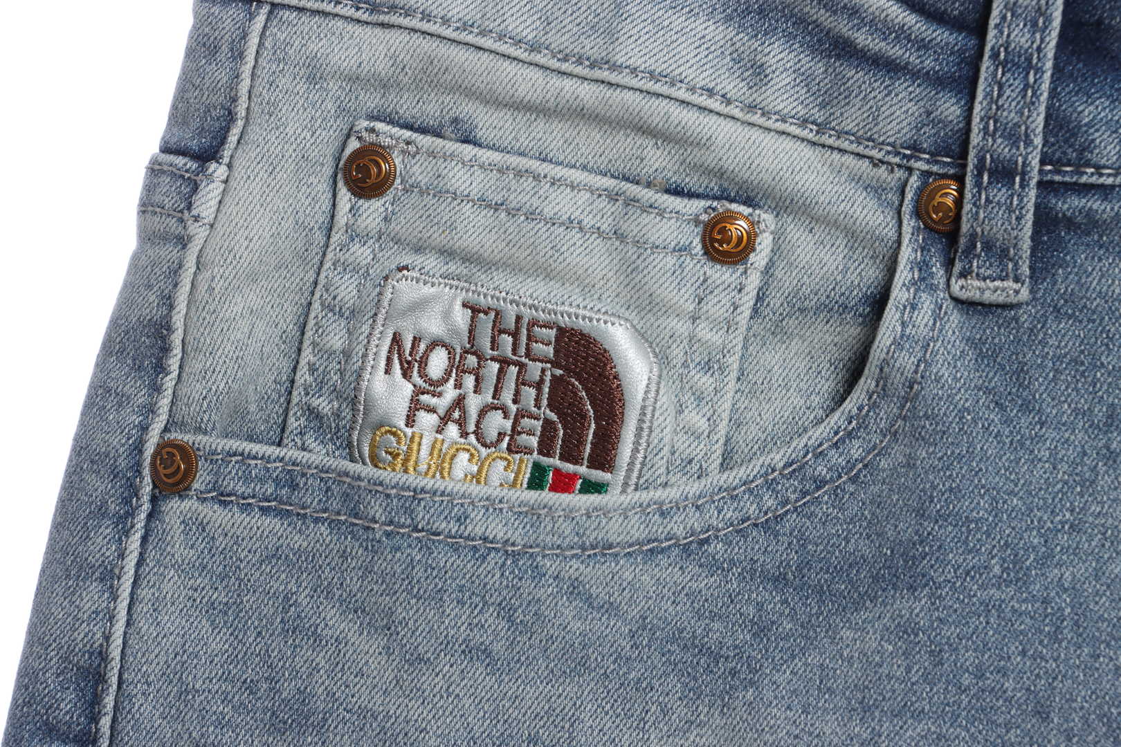 Gucci x The North Face Embroidered Logo Denim Trousers