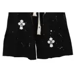 Chrome Hearts ink-splashed leather shorts with silver trim, black