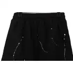 Chrome Hearts ink-splashed leather shorts with silver trim, black