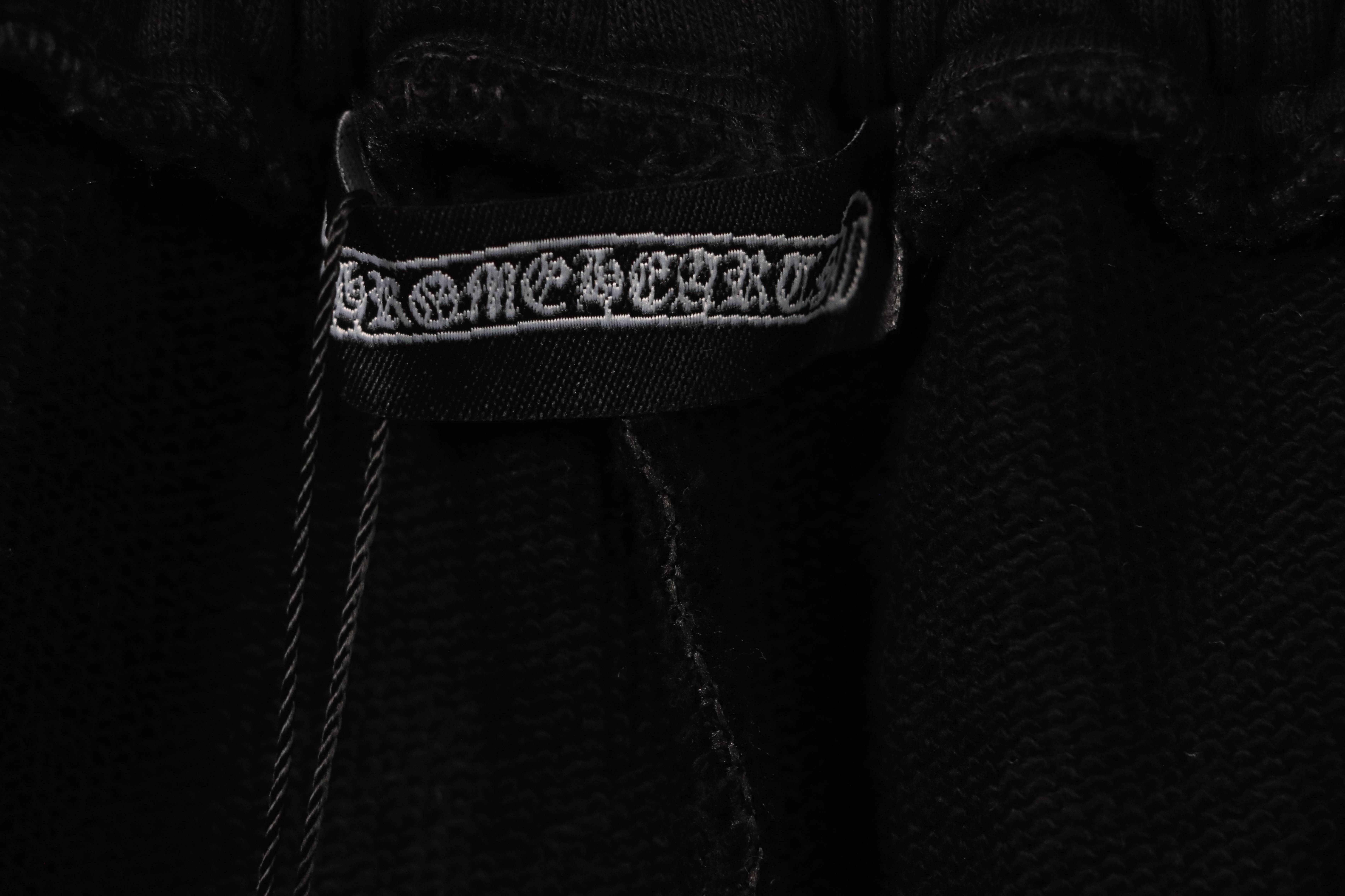 Chrome Hearts ink-splashed leather shorts with silver trim, black