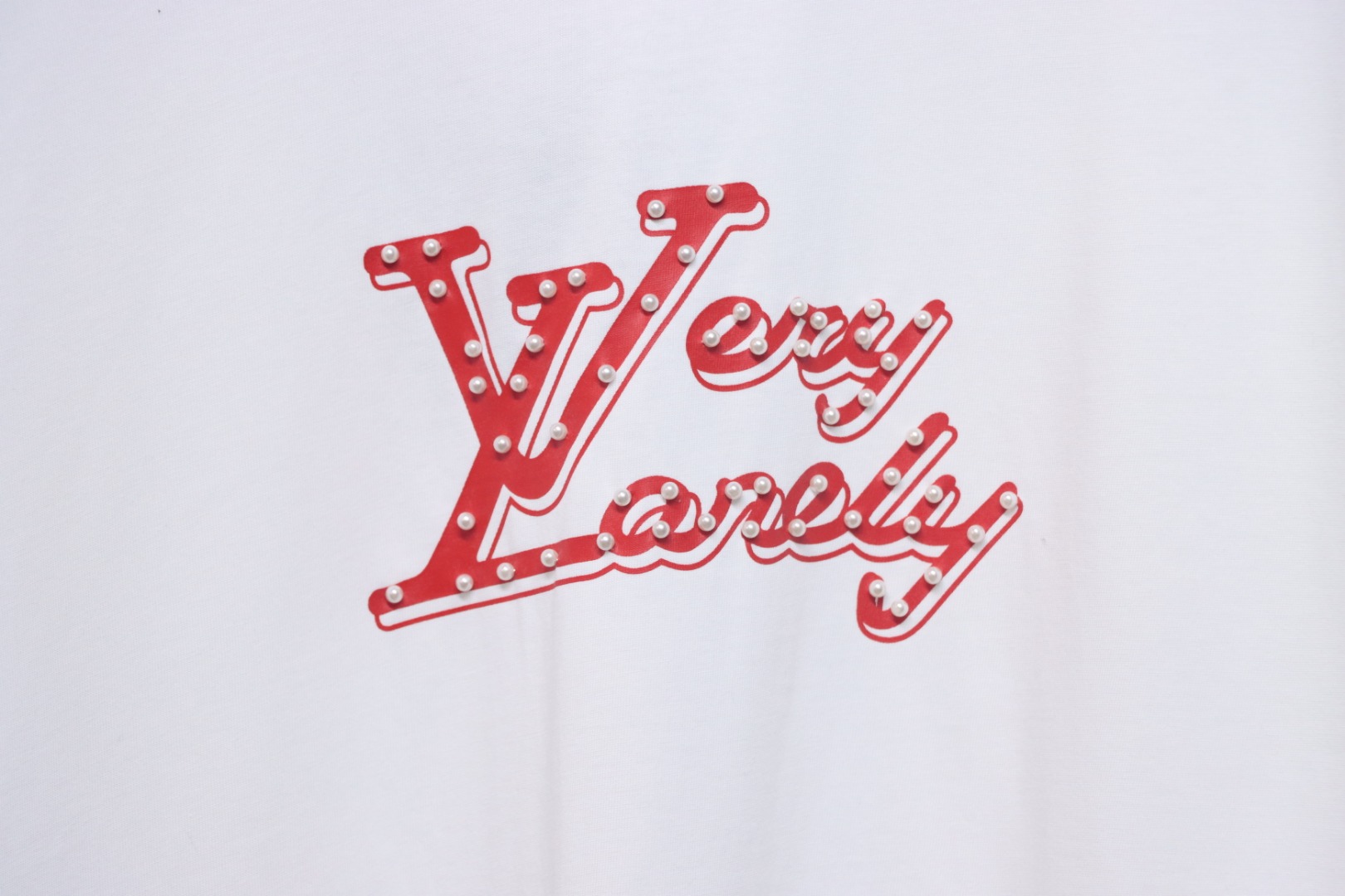 Louis Vuitton spotted red hollow print short sleeve white