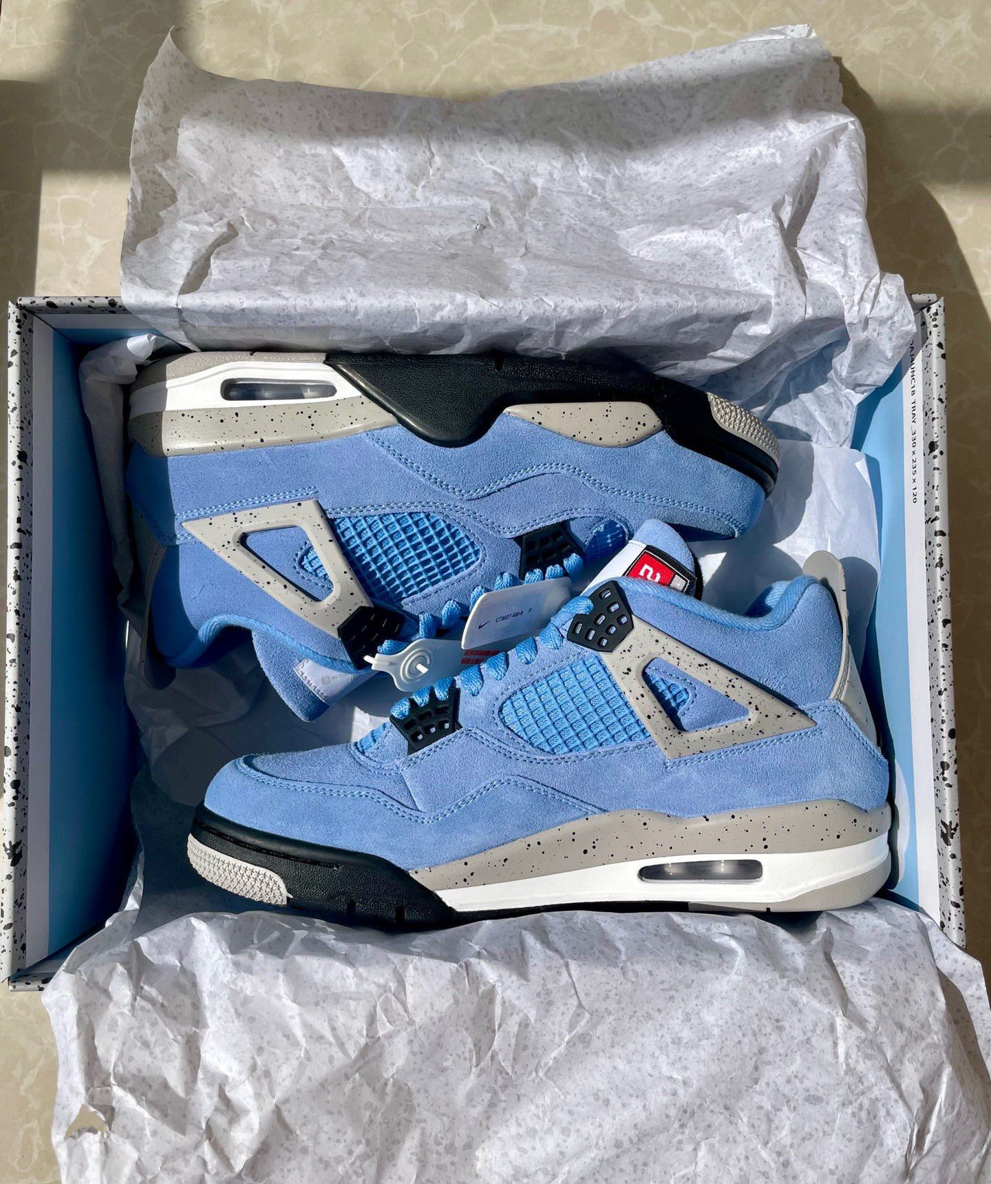 Air Jordan 4 Retro University Blue  CT8527-400 review nikas 01