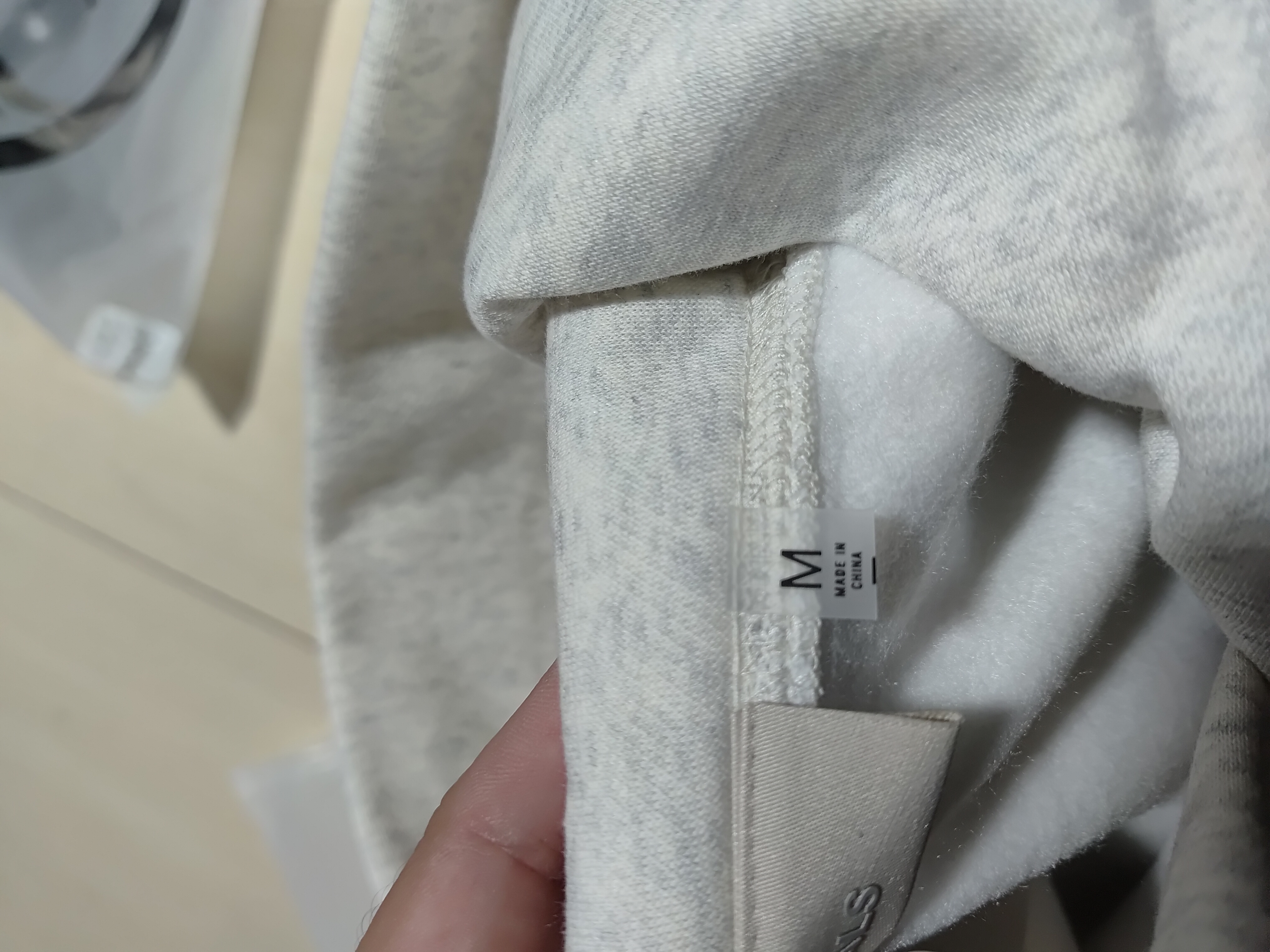 OBO Fear of God Essentials Hoodie Light Oatmeal review Obosneaker 01
