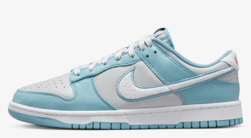 Fleece Swooshes Hit The Nike Dunk Low Worn Blue