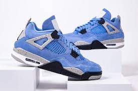 A touch of jordan 4 university blue reps with textured details 