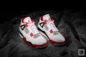 Exclusive close-up view of the latest replica color of the Air Jordan 4 OG, 'Fire Red'