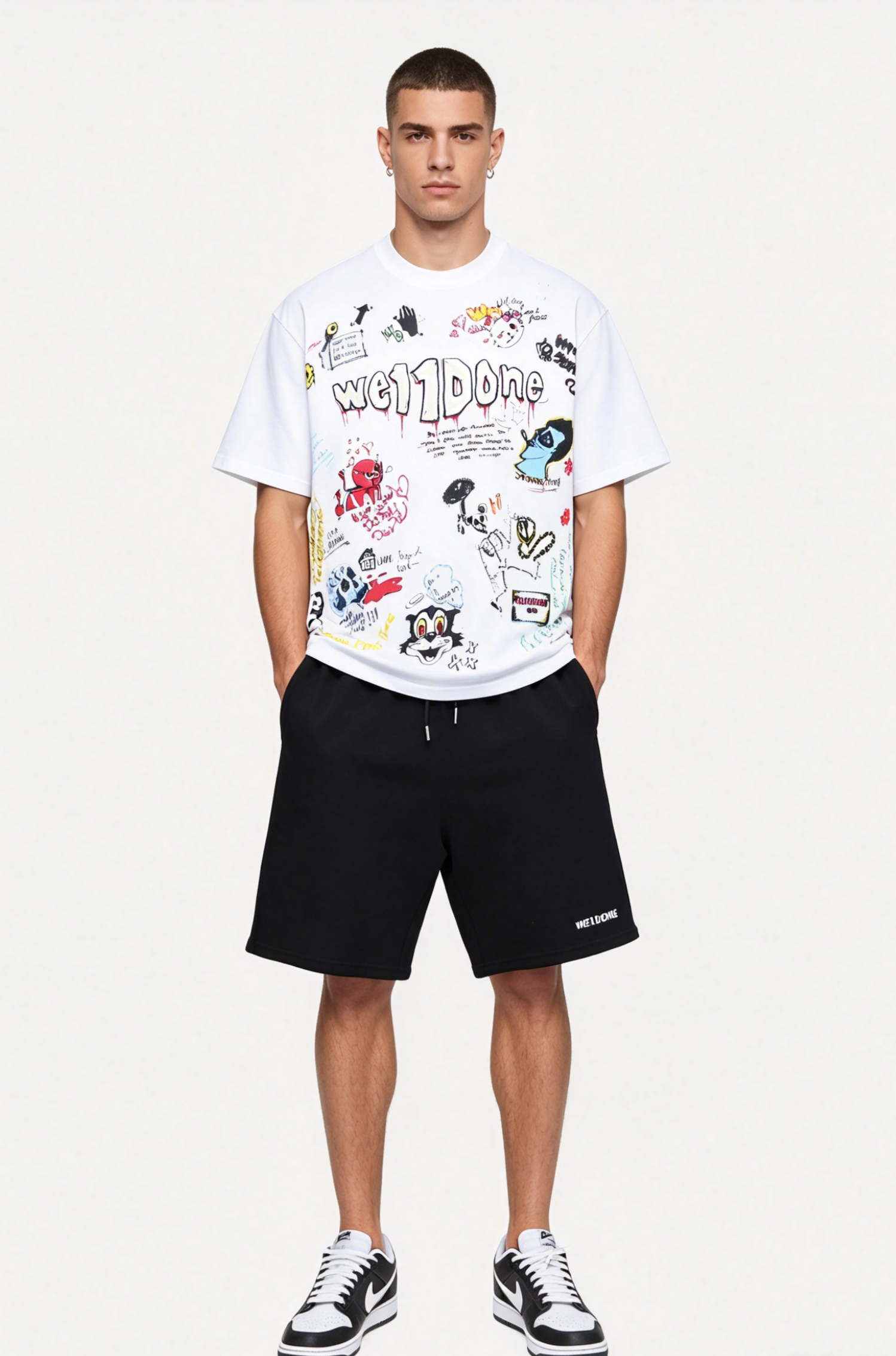 WE11DONE T-shirt graffiti hand-painted and 24SS Letter Logo Shorts Suit