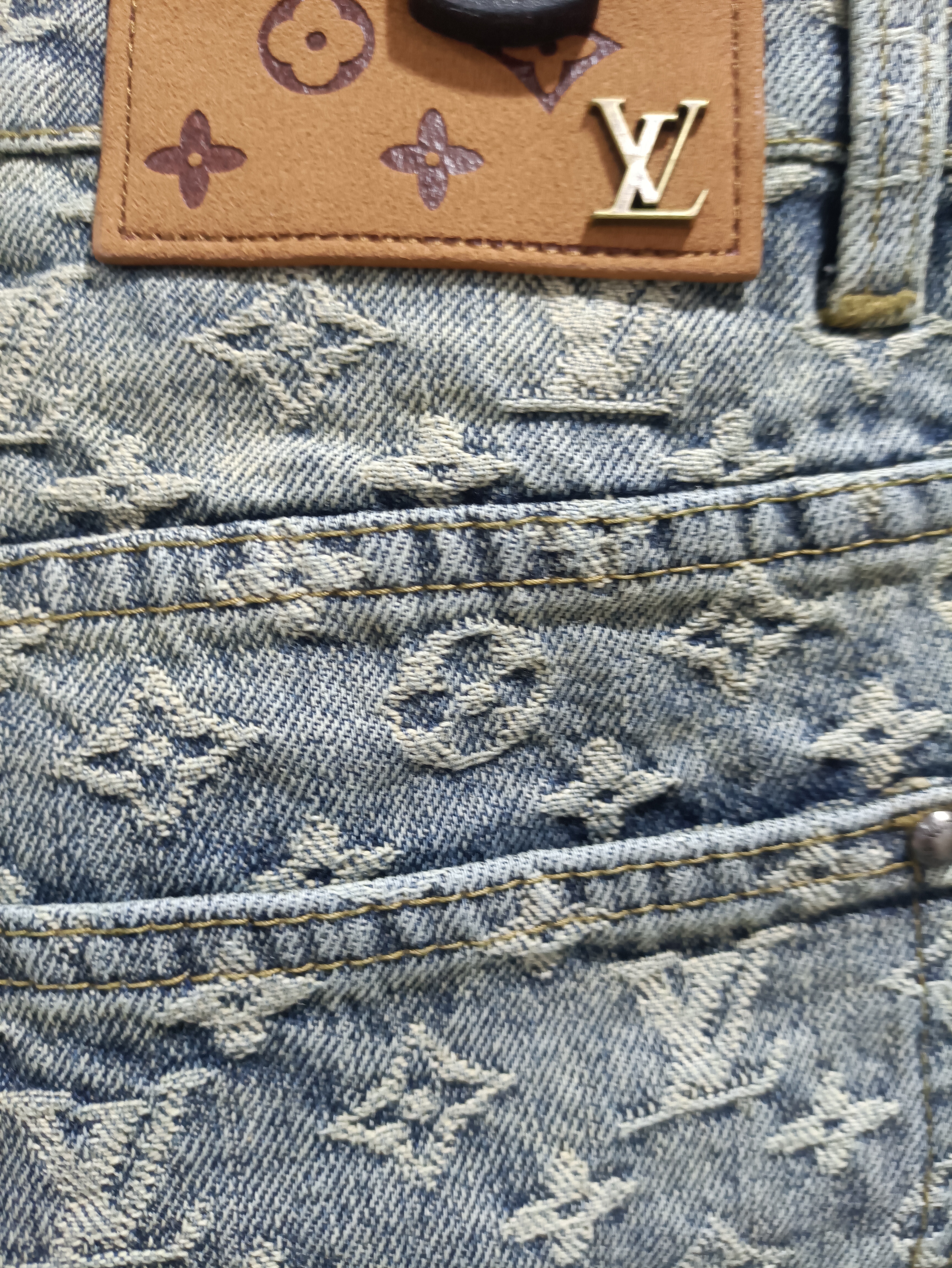 Louis Vuitton distressed washed full print denim shorts Jeans