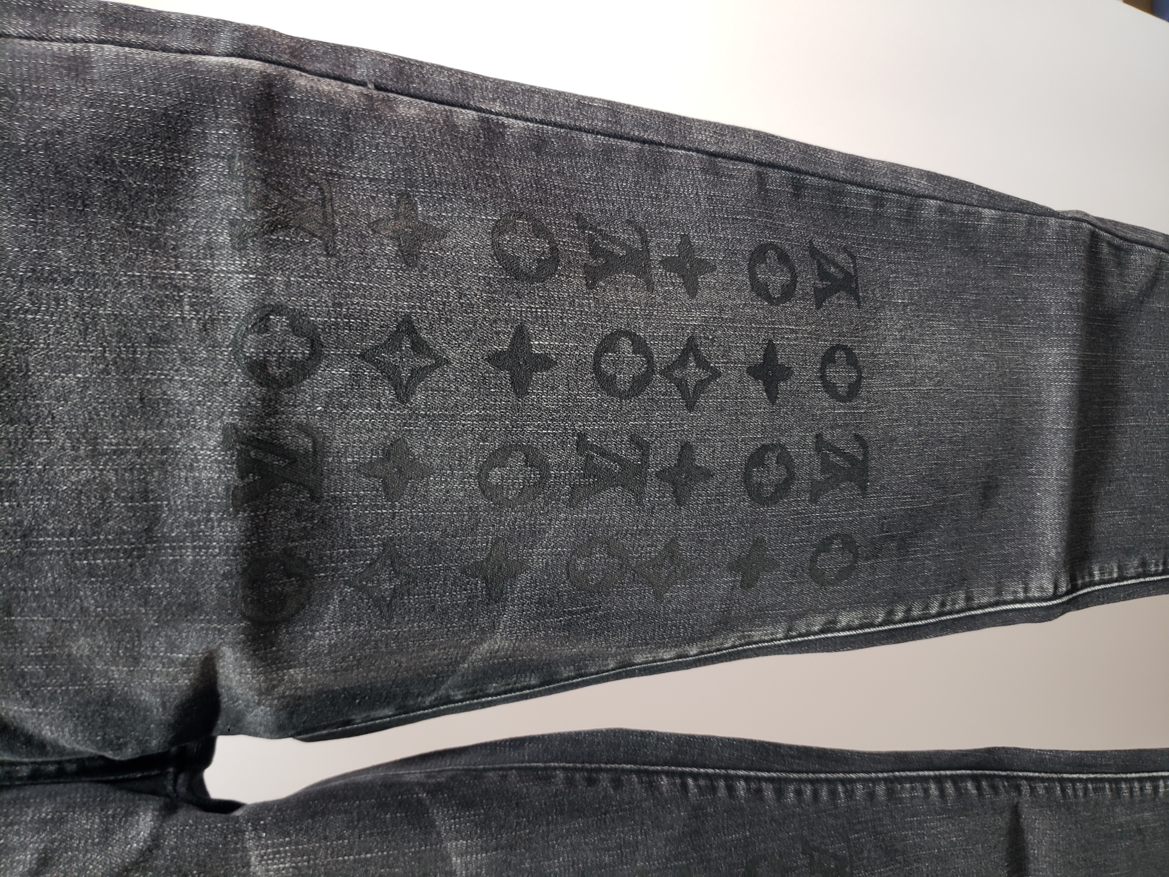 Louis Vuitton washed monogram torn Jeans