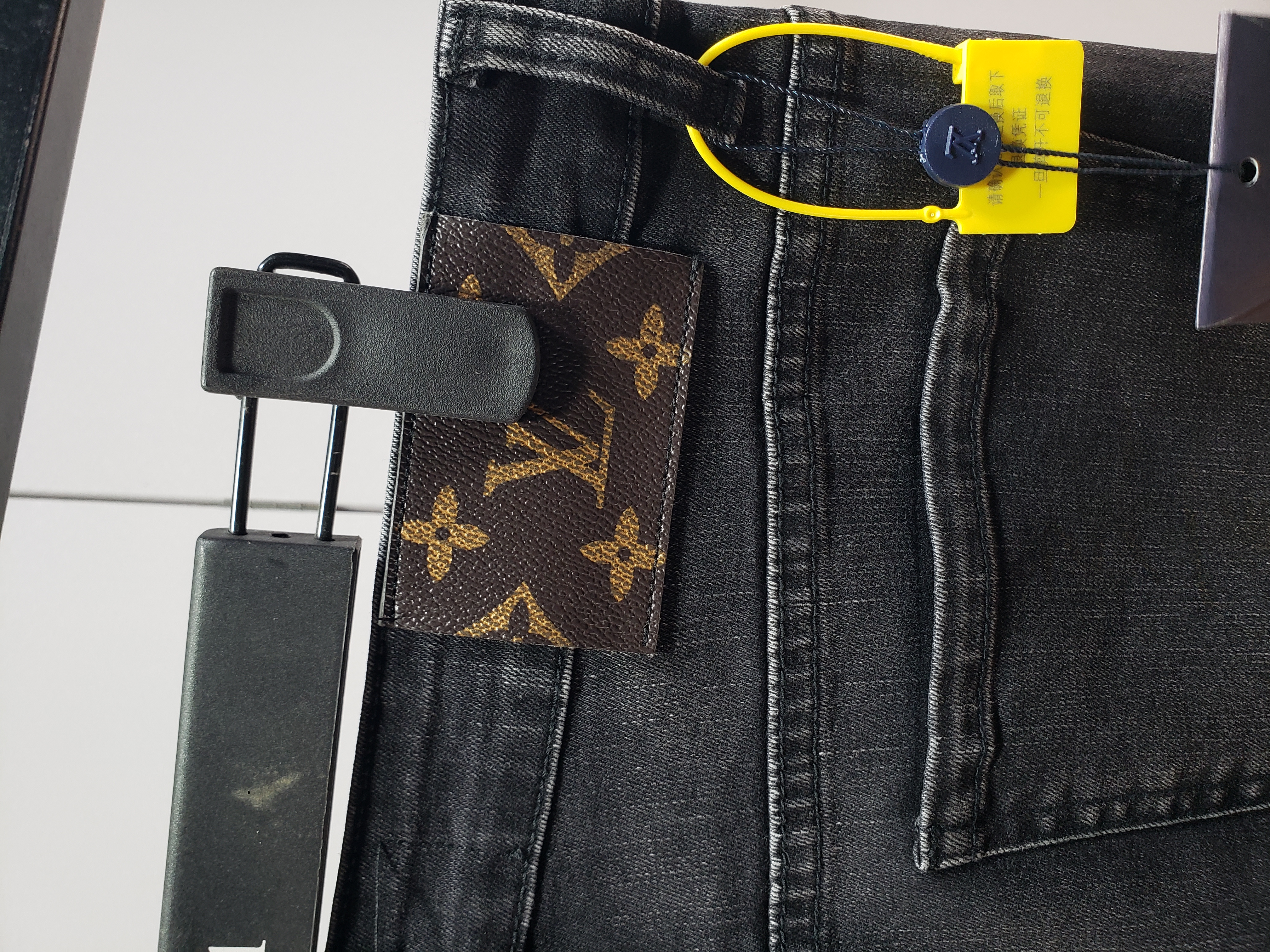 Louis Vuitton washed monogram torn Jeans