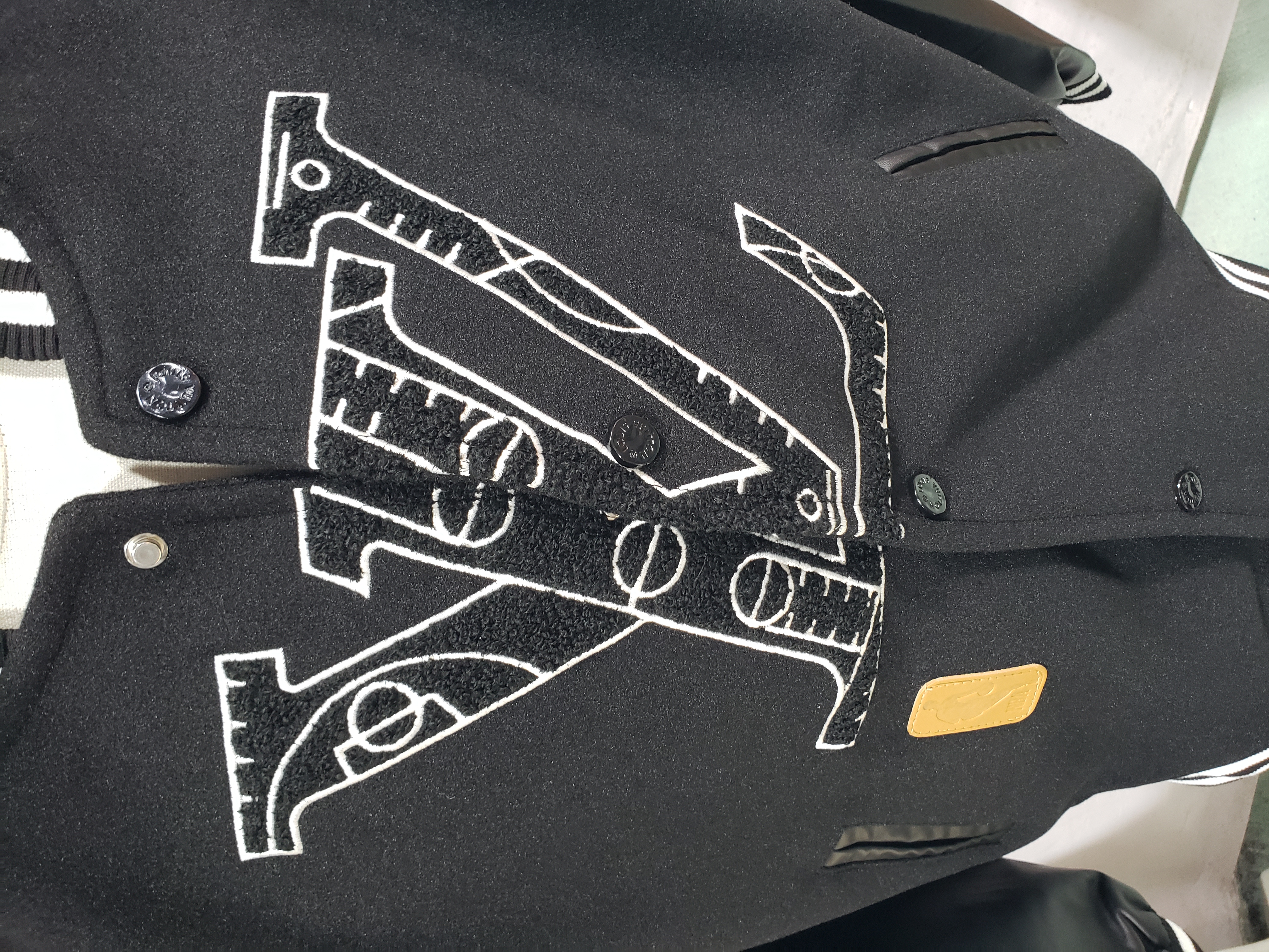 Louis Vuitton NBA patchwork sleeve baseball jacket