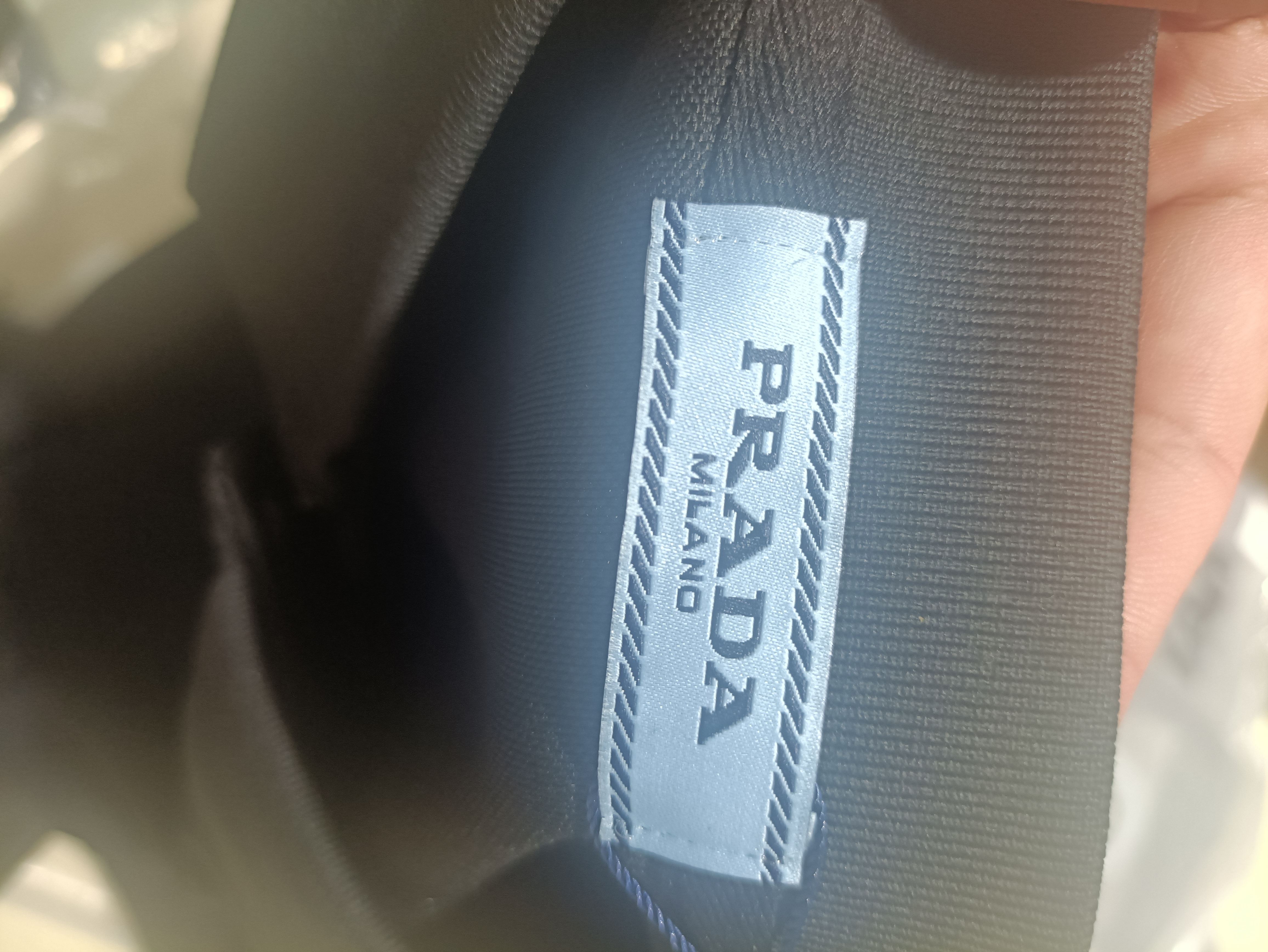 Prada classic triangle cotton polo black