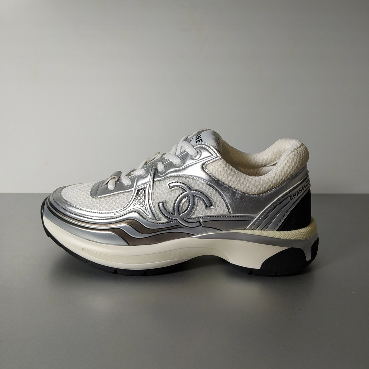 QC Pics Of Chanel CC Logo Sneaker 'White Silver' Reps at Replica Online