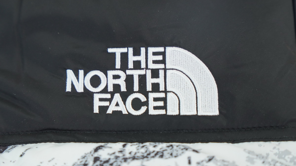 TheNorthFace Splicing White And Snow Mountain
