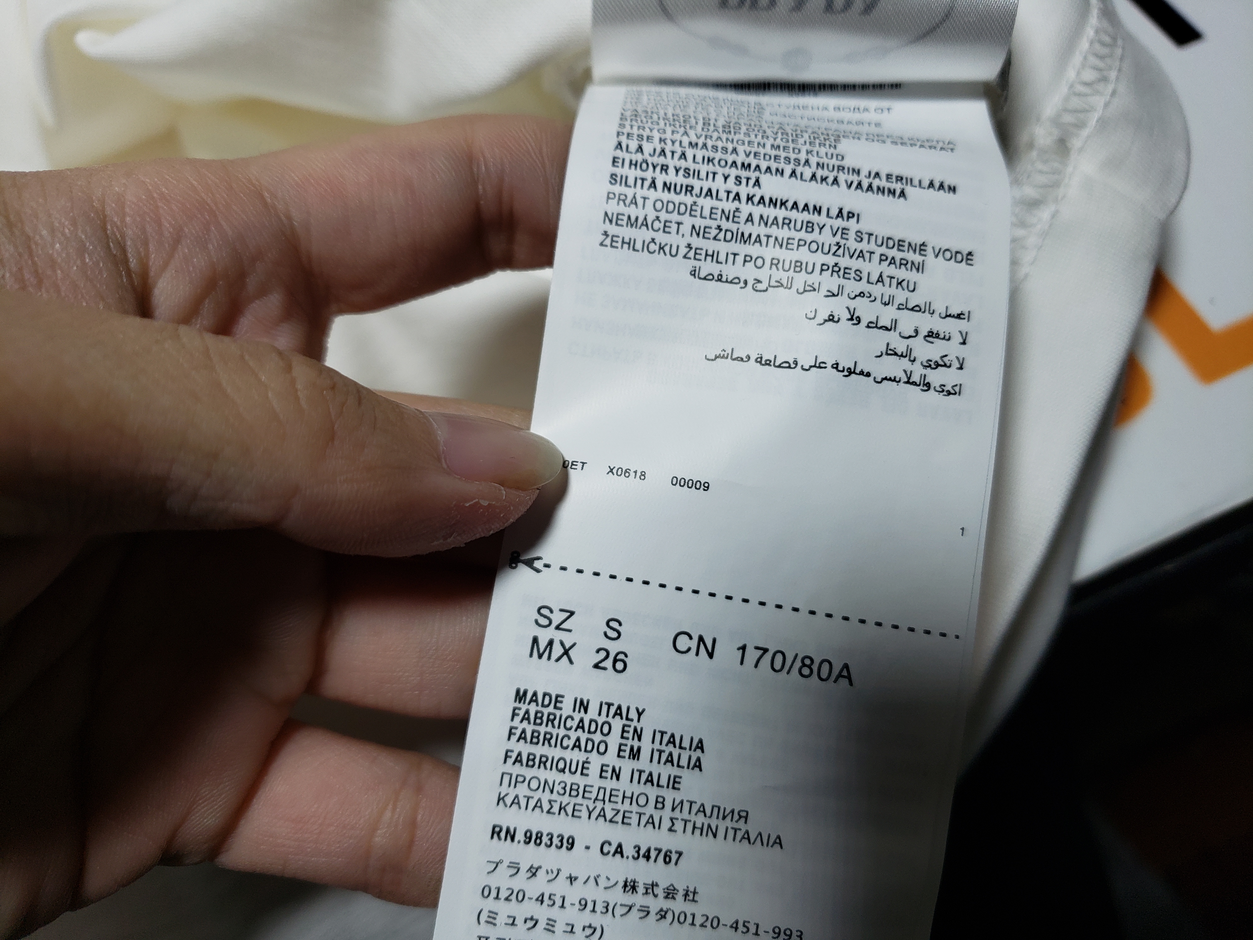 Prada 24Fw metal logo long-sleeve T-shirt with triangle pocket 1901