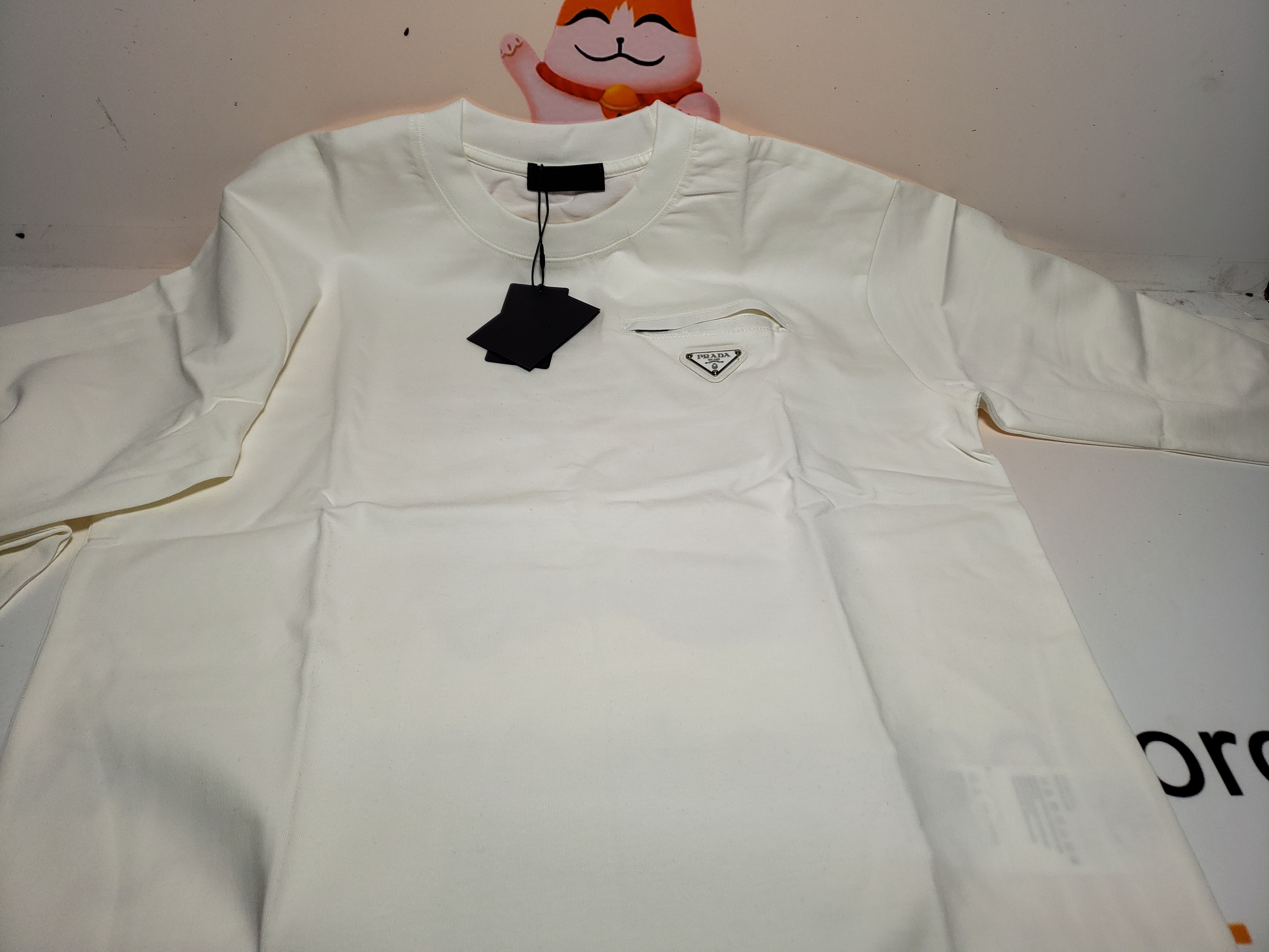 Prada 24Fw metal logo long-sleeve T-shirt with triangle pocket 1901