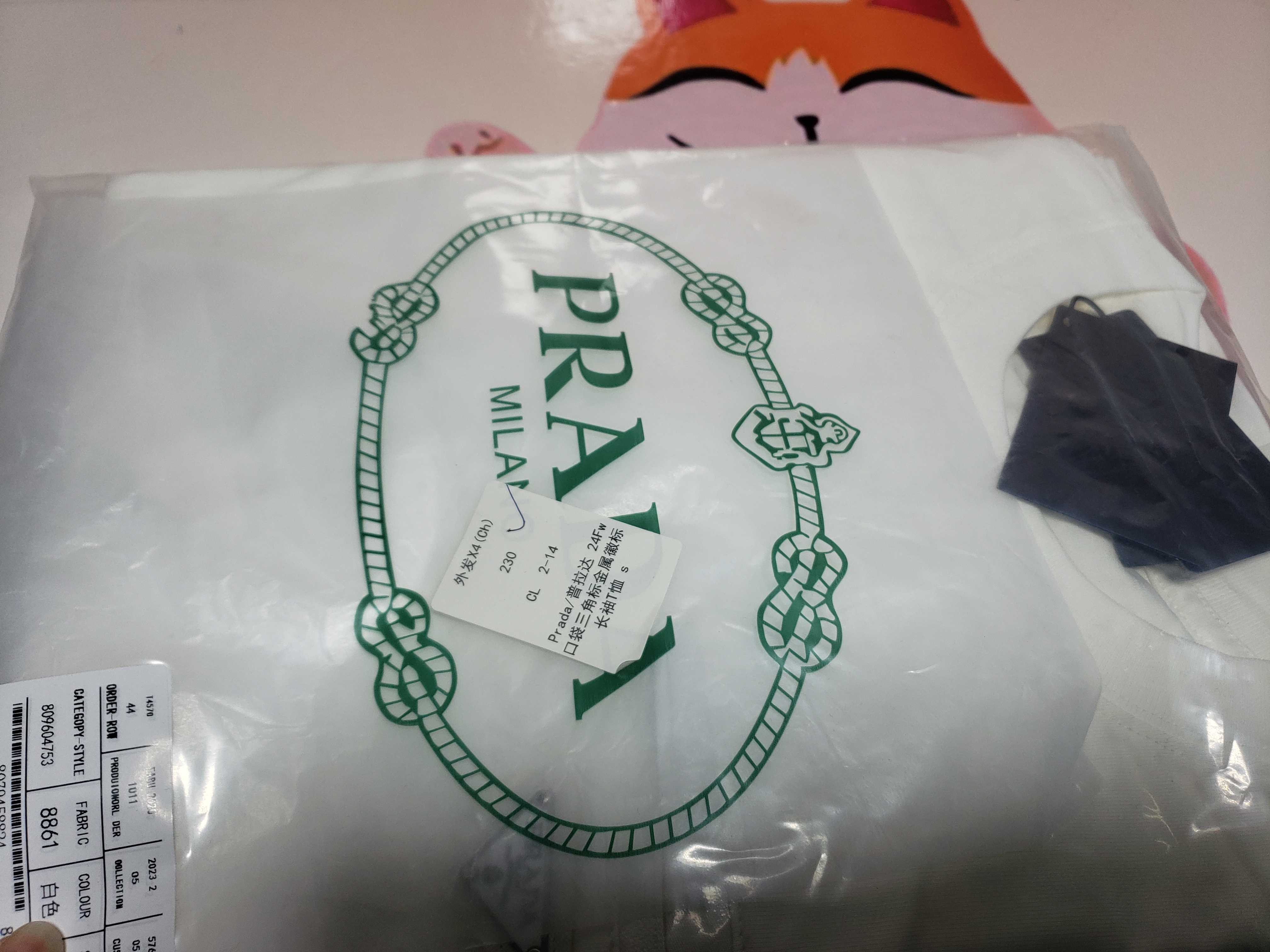 Prada 24Fw metal logo long-sleeve T-shirt with triangle pocket 1901