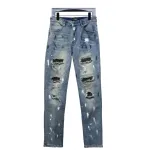AMIRI ink-splashed rhinestone jeans