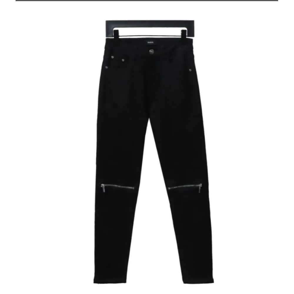 AMIRI MX1 zip-up washed stretch denim trousers