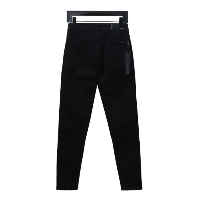 AMIRI MX1 zip-up washed stretch denim trousers