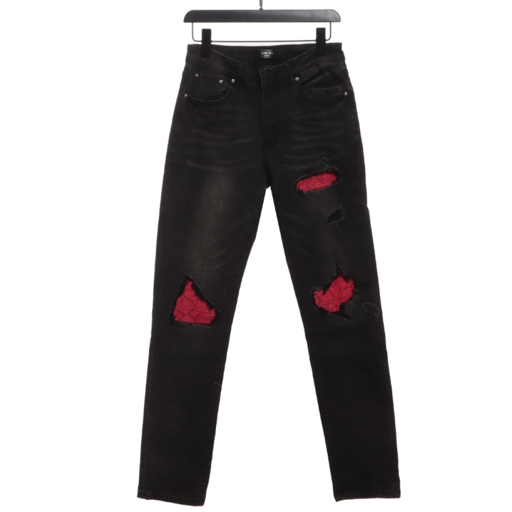 AMIRI pink ripped denim trousers