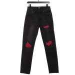 AMIRI pink ripped denim trousers