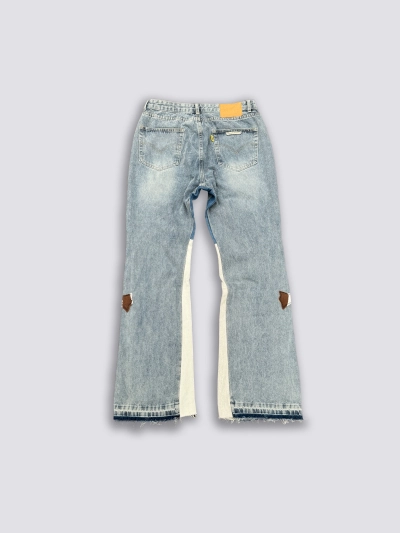 GALLERY DEPT. Denim patchwork cropped flared jeans with a washed and distressed look, featuring faux fur patchwork and leather upholstery GA004 02