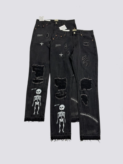 GALLERY DEPT. Skull-patterned distressed jeans G22 01