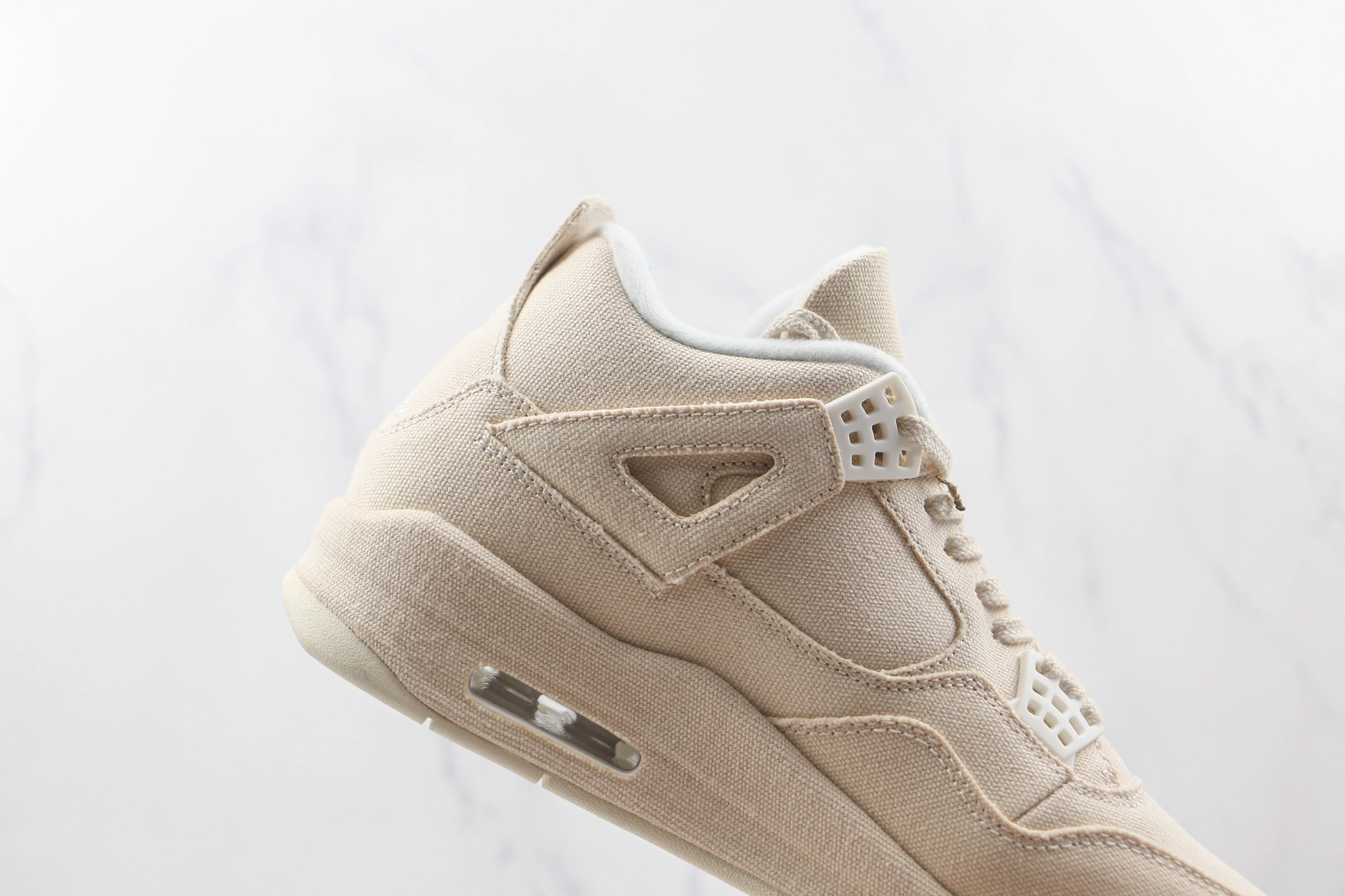 Air Jordan 4 WMNS “Canvas”