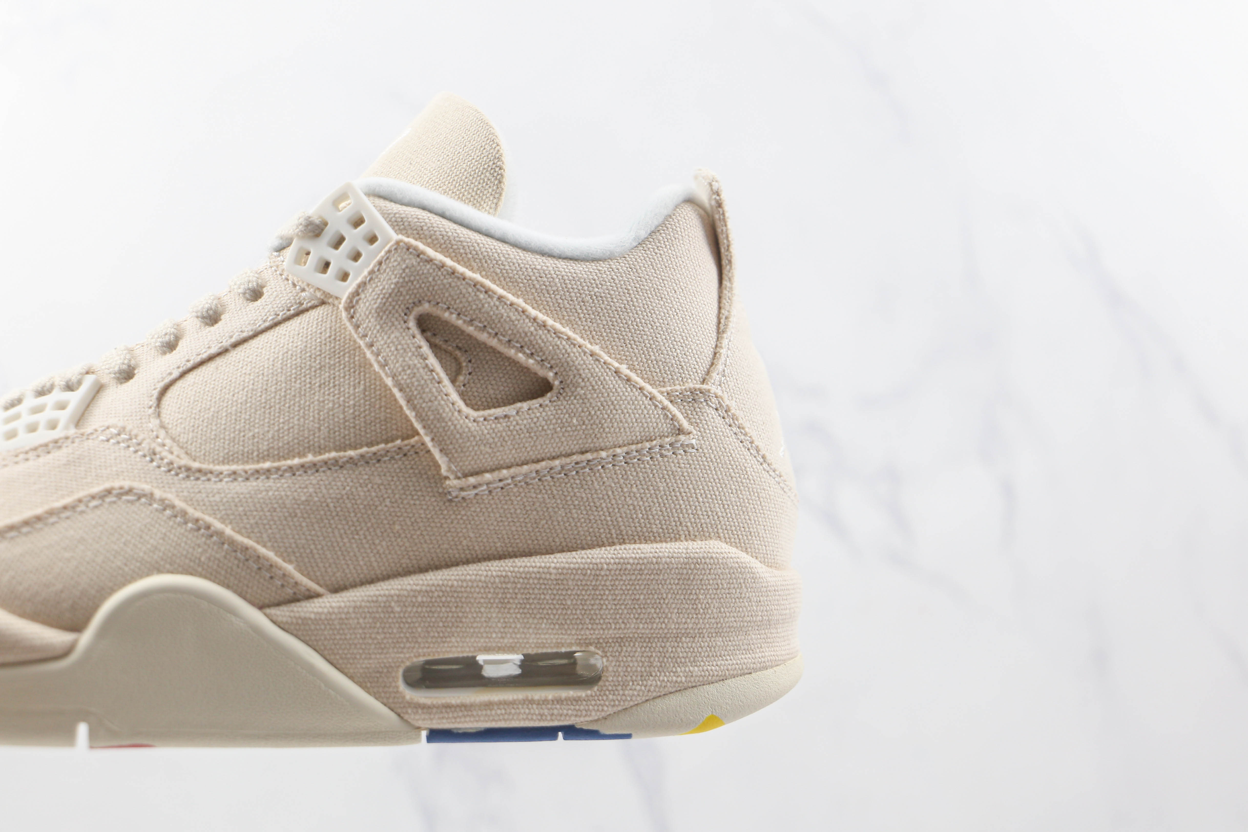 Air Jordan 4 WMNS “Canvas”