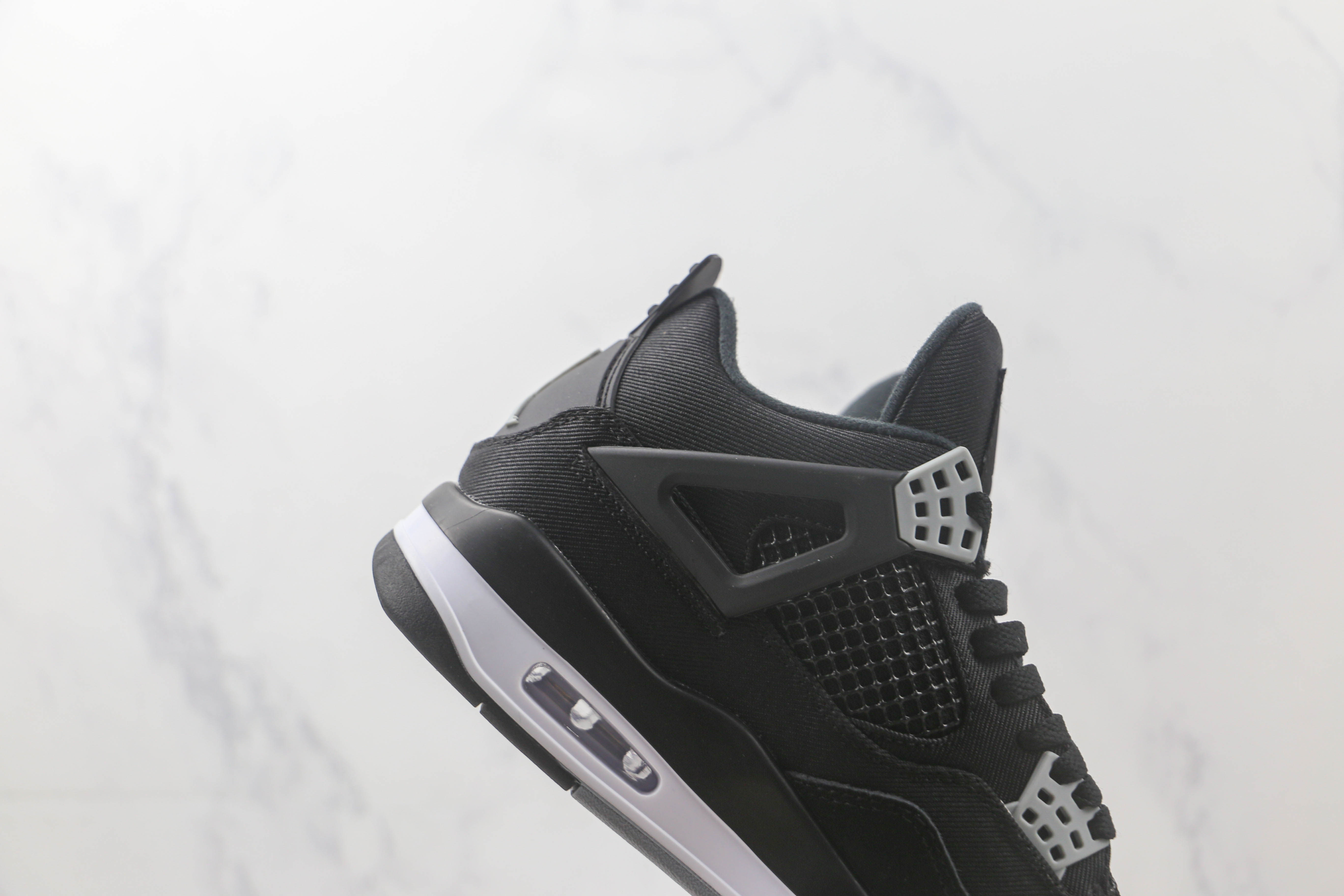 Air Jordan 4 Retro Black Canvas