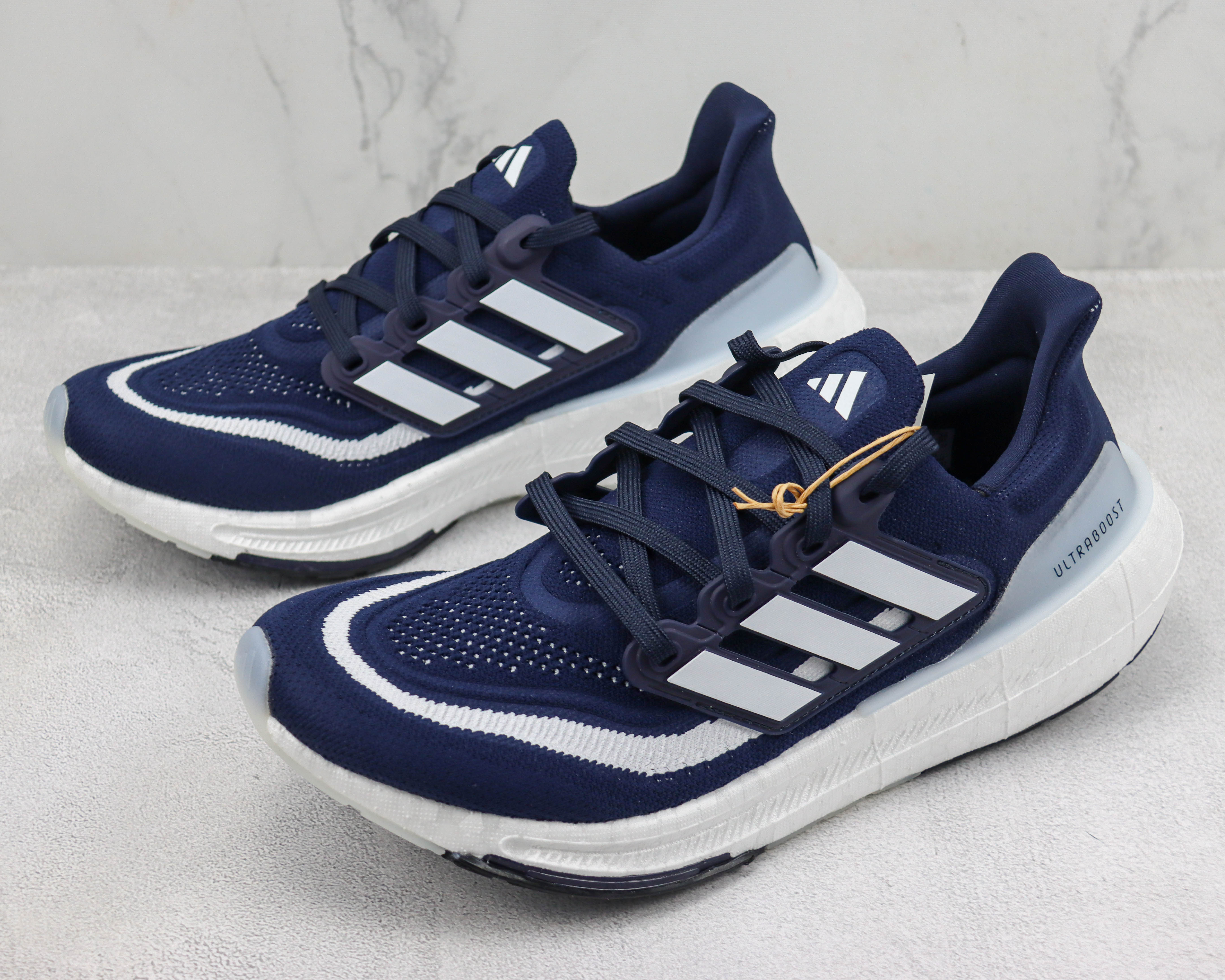 Adidas Ultra Boost 2023 LIGHT Black And White Blue and white bars