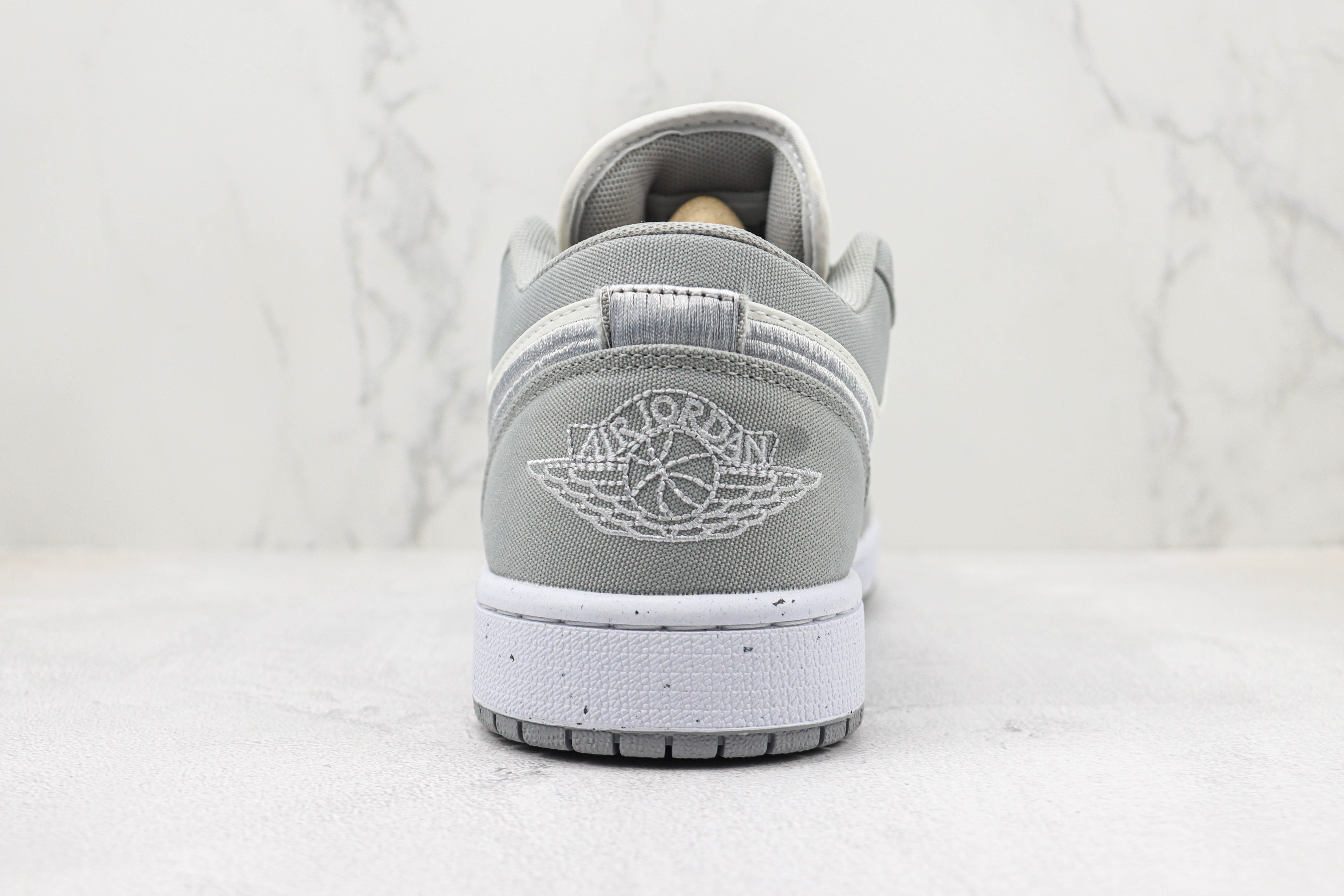 Travis Scott x Air Jordan 1 Low Retro Grey White