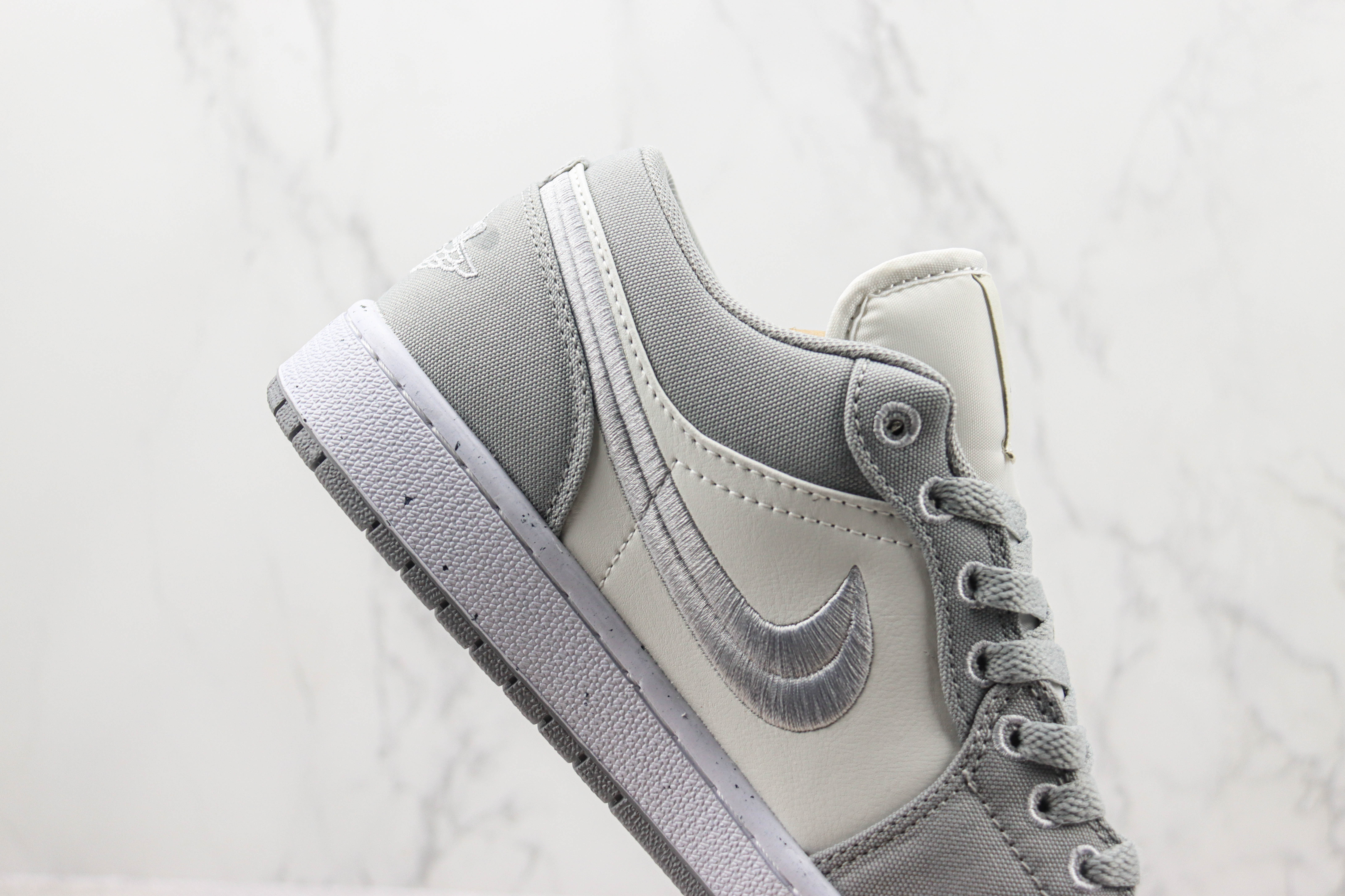 Travis Scott x Air Jordan 1 Low Retro Grey White