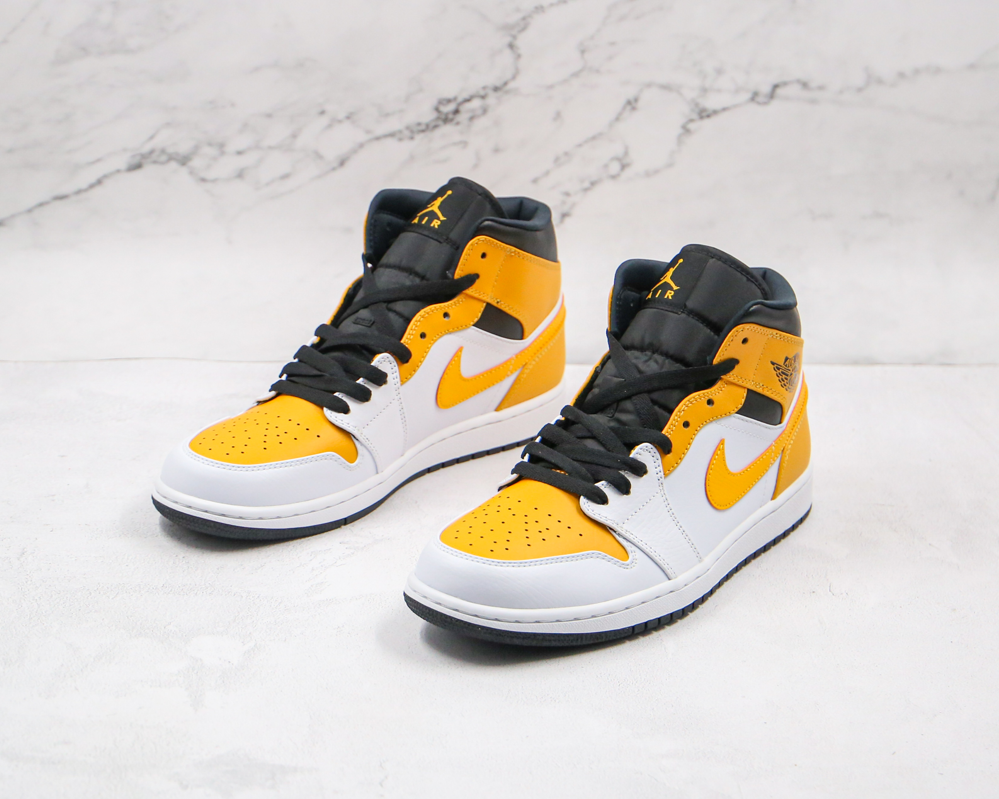 Air Jordan 1 Mid University Gold