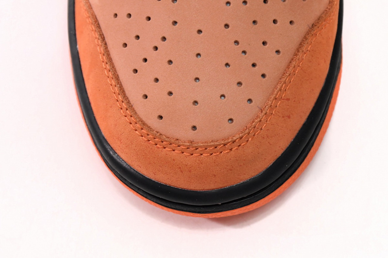 SX Concepts x Nike SB Dunk Low “Orange Lobster”