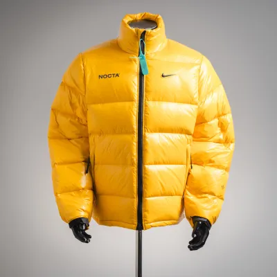 Nike x NOCTA Sunset Puffer Jacket Yellow 02