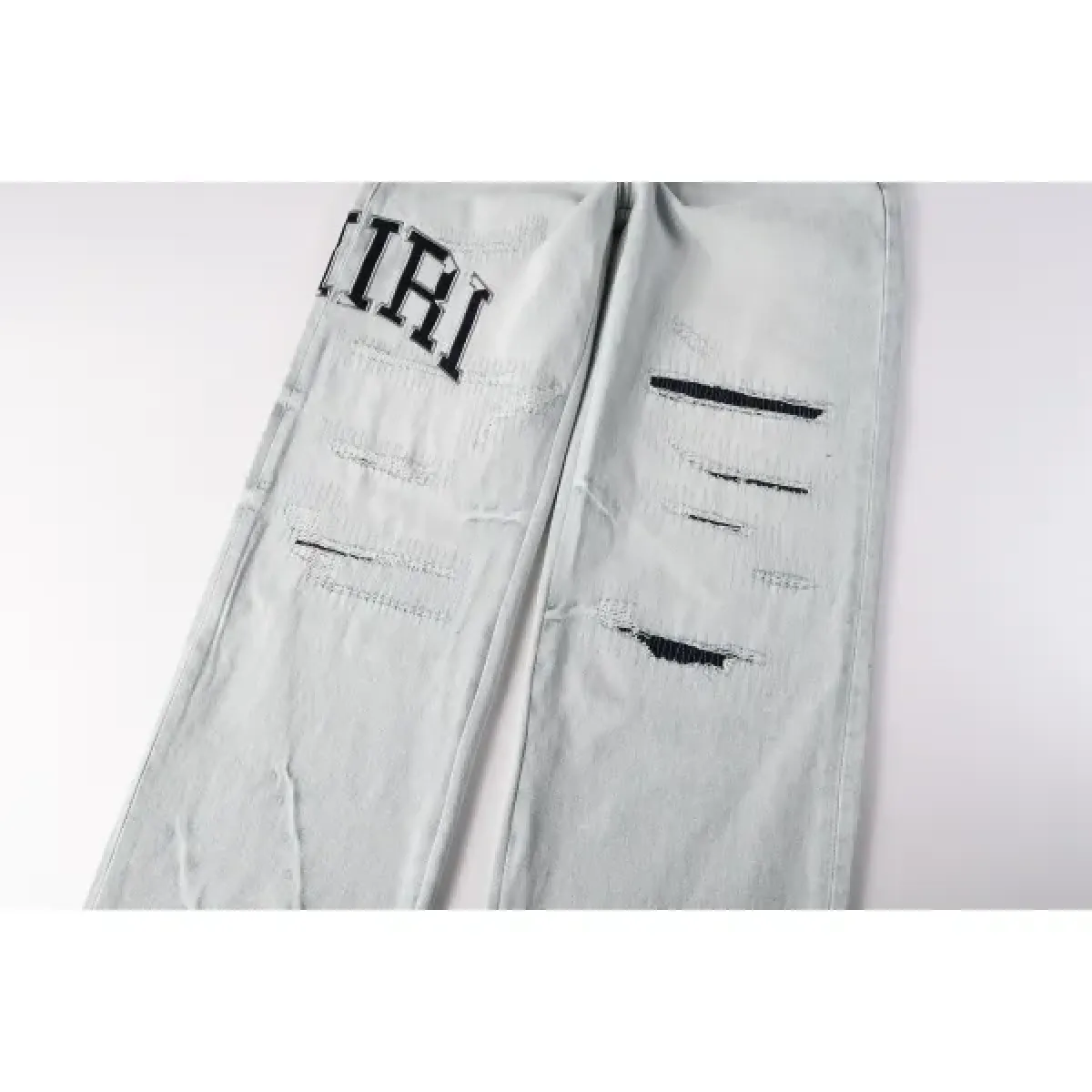 Amiri Jean Light Wash Blue 8916