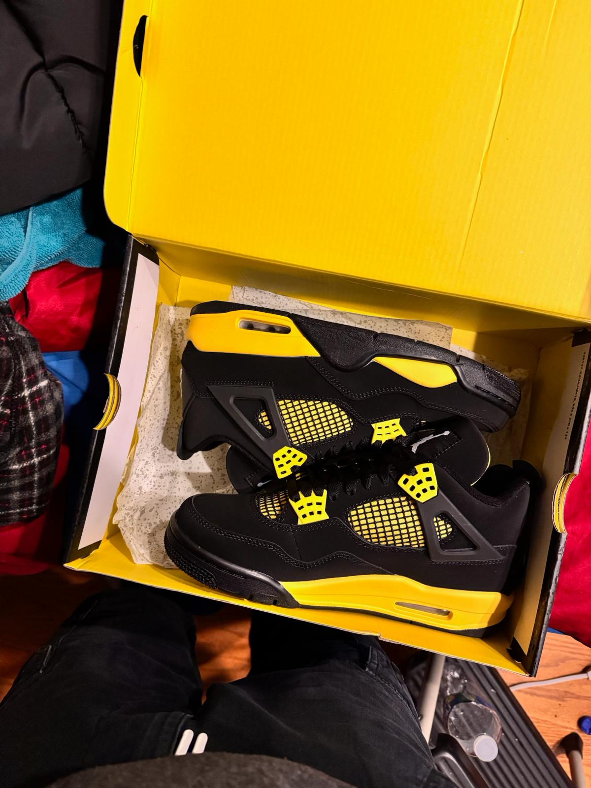 Jordan 4 Retro Thunder DH6927-017 review Pharell