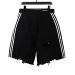 Balenciaga co-branded washed and ripped denim shorts Jeans