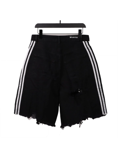 Balenciaga co-branded washed and ripped denim shorts Jeans 01