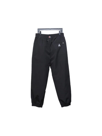 Moncler 22Fw silicone logo nylon woven cuffed trousers Pants 02