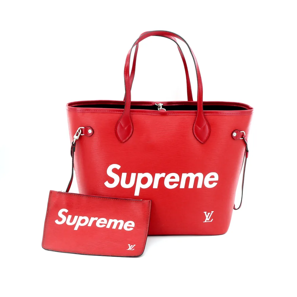 S*p*e water ripple red handbag